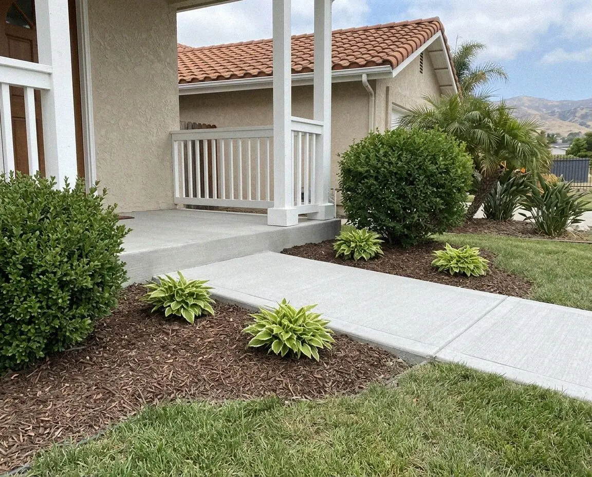 New broom-finished concrete front walk running to a porch in Torrance