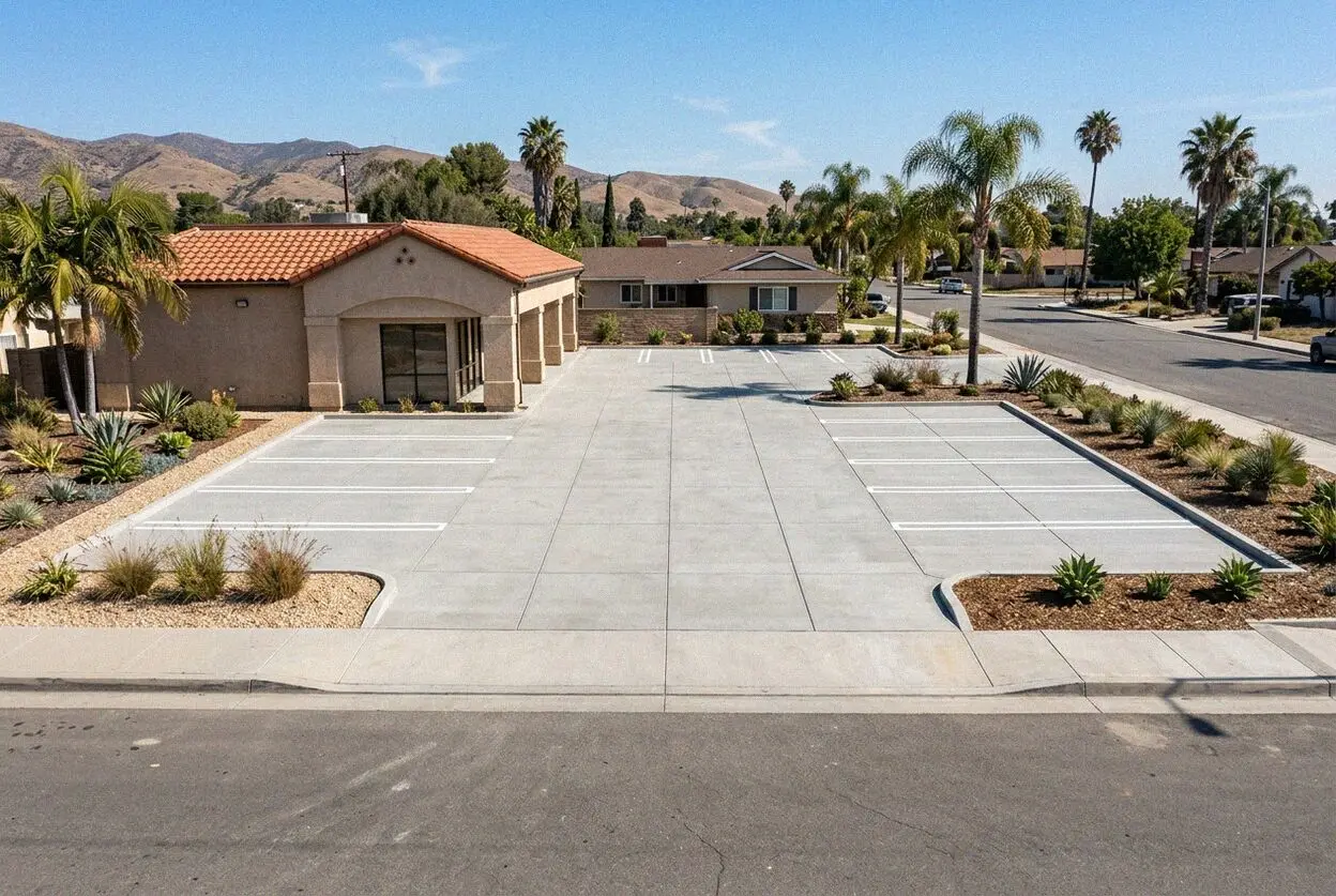 Concrete parking bays in front of an auto repair shop in Gardena